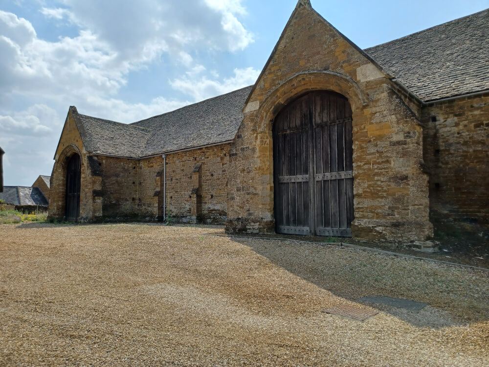 Stone barn with timber doors, one of the buildings restored with OBT grant aid